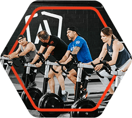 Photo icon of a gym full of people on bikes
