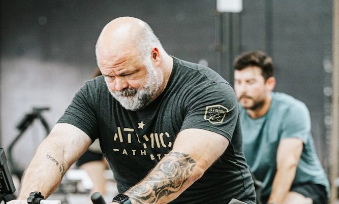 jeff.atomic.austin.athlete.training.as.you.age Older guy riding a stationary bike